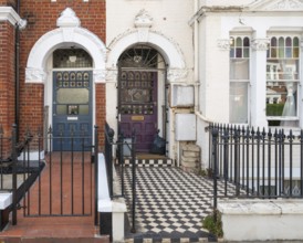 Victorian entrances, blue and purple doors, black and white tile pattern, Kensington, London,