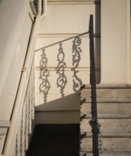 Shadow of an artistically decorated banister on a house wall, Notting Hill, London, England, Great