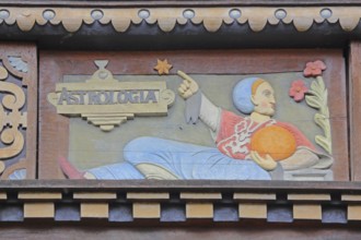 Allegorical woodcarving with figure on astrology with stars and planets, Renaissance, allegory,