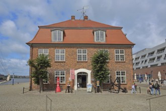 Baroque tree house with Swedish heads and stick anchors, decoration, brick building, tourists, Old