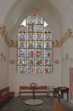 Colourful church window by Master Bertram built 14th century, interior view, stained glass, arts