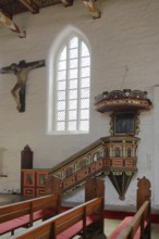 Pulpit with pulpit bonnet and crucifix of the Church of the Holy Spirit, interior view,