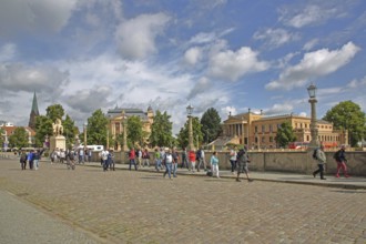 Castle bridge with stream of visitors to the castle and state museum, group of tourists,
