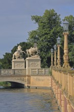 Castle bridge with two horse figures, castle lake, street lamps, shore, balustrade, Schwerin,