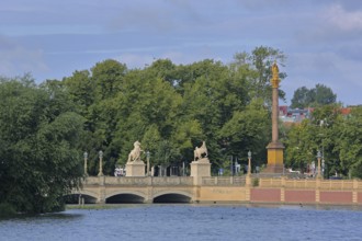 Castle bridge and Victory Column, stone arch bridge, horse figures, castle lake, shore, balustrade,
