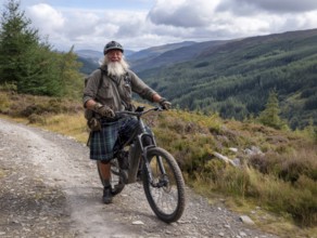 A senior, Highlander with a Scottish kilt sits on a mountain bike, e-bike, pedelec, AI generated,