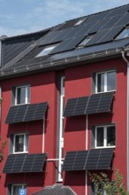 Residential building with photovoltaic modules on the façade and roof, North Rhine-Westphalia,