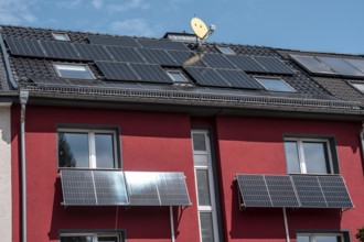 Residential building with photovoltaic modules on the façade and roof, North Rhine-Westphalia,