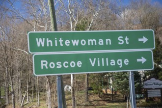 Coshocton, Ohio - A sign points to Whitewoman Street in Historic Roscoe Village. Whitewoman Street