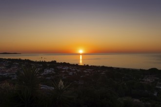 The sun rises on the Costa Rei, a stretch of coastline on the Italian Mediterranean island of