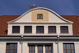 Blaumännle, heraldic figure, town coat of arms, logo, front of the primary school, Blaubeuren,