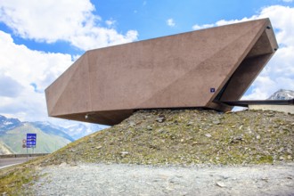 Timmelsjoch Pass Museum of reddish-coloured concrete with entrance on Austrian territory on the