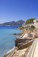 House on the seashore of the blue Mediterranean Sea on a sunny summer day, Sant elm, Mallorca,