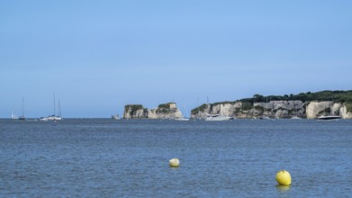 Boats on sea over Knoll Beach Studland, Poole, Dorset, England, United Kingdom