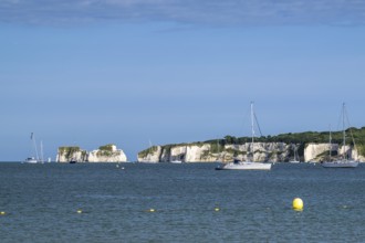 Boats on sea over Knoll Beach Studland, Poole, Dorset, England, United Kingdom