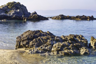 Rocky seascape with sandy beach and clear water, Ricadi, Capo Vaticano