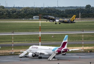 Düsseldorf Airport, Eurowings aircraft taking off, Eurowings Airbus on the apron, BVB Borussia