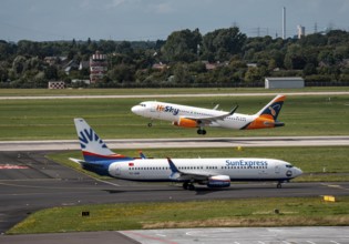 Düsseldorf Airport, Sunexpress Boeing 737 aircraft on the apron, HiSky Europe Airbus A320-200
