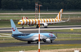 Düsseldorf Airport, Condor Airbus on take-off, TUIFly Boeing 737 on the way to take-off, North