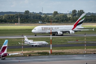 Düsseldorf Airport, Emirates Airbus A380-800, on take-off, Dassault Falcon 7X, of the American