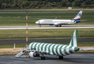 Düsseldorf Airport, Condor Airbus A321-200, aircraft on the apron, SunExpress Boeing 737 taking