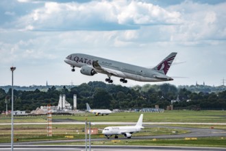 Düsseldorf Airport, Qatar Boeing 787-8 Dreamliner on take-off, Eurowings Airbus aircraft after