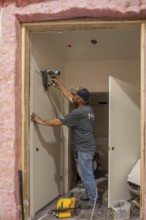 Romulus, Michigan - Workers build apartments in Ginosko Modular 's factory using modular