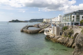 Seafront coastline waterfront, city of Plymouth, Devon, England, UK view west to Drake's Island and