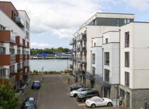 Modern apartment housing in old docks area, Trinity Street, Millbay marina village development,