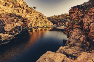 Bell Gorge waterfall, a body of water in north-west Australia in the Kimberley. Sunrise in the
