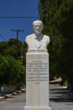 Paris Roussos, fighter for unification with Greece, marble bust on a pedestal with inscription,