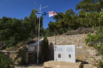 HMS Intrepid, British battleship, Greek battleship AT Olga, memorial with two flags and a plaque in
