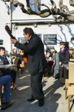 Traditional guitar player, singer in a restaurant, pilgrimage in Saintes-Maries-de-la-Mer,