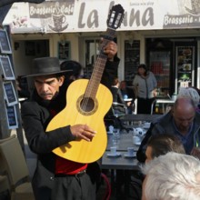 Traditional guitar player, singer in a restaurant, pilgrimage in Saintes-Maries-de-la-Mer,