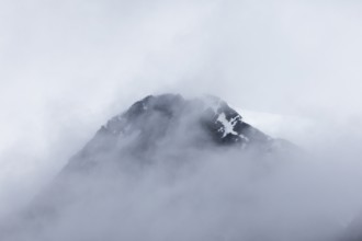 Mountain peak in the fog, Bamsebu, Spitsbergen, Svalbard