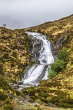 Eas a' Bhradain waterfall, Red Cuillin mountains, Loch Ainort, Isle of Skye, Scotland, UK
