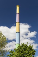 Art project by Daniel Buren, colourfully designed chimney at power plant Nord, also known as