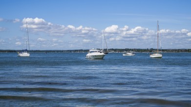 Boats over Brownsea Island, Poole, Dorset, England, United Kingdom