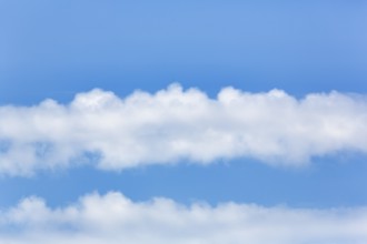 Cumulus in the blue sky, stripes, Saintes-Maries-de-la-Mer, Camargue, France