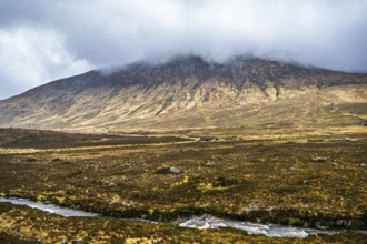 Eas a' Bhradain waterfall, Red Cuillin mountains, Loch Ainort, Isle of Skye, Scotland, UK