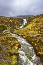Eas a' Bhradain waterfall, Red Cuillin mountains, Loch Ainort, Isle of Skye, Scotland, UK