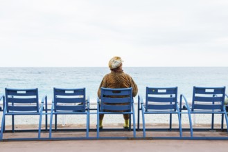 Woman on the promenade, Nice, Alpes Maritimes, Provence Alpes Cote d'Azur, French Riviera, South of