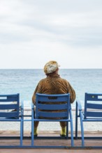 Woman on the promenade, Nice, Alpes Maritimes, Provence Alpes Cote d'Azur, French Riviera, South of
