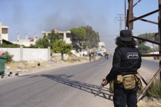 Syrian army military vehicles were destroyed as a result of Israeli airstrikes in Sweida city