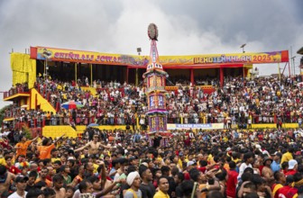 JOWAI, INDIA - JULY 14: People from the Pnar community march in a circle around a Rot as they
