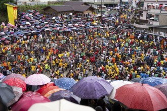 JOWAI, INDIA - JULY 14: People from the Pnar community march in a circle as they celebrate an event