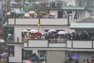 JOWAI, INDIA - JULY 14: People from the Pnar community emjoy the Behdienkhlam festival from rooftop
