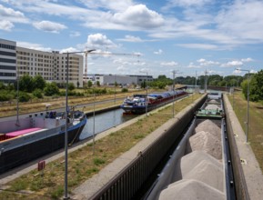 Barges in the Edersheim lock near Hattersheim, Hesse, Germany
