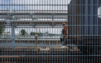 Lattice fence on the factory bridge over the River Main in Kelsterbach, Hesse, Germany