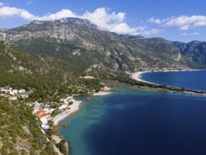 A picturesque coastal landscape with blue sea, beach and majestic mountains, Fethiye, Mugla, Mugla,